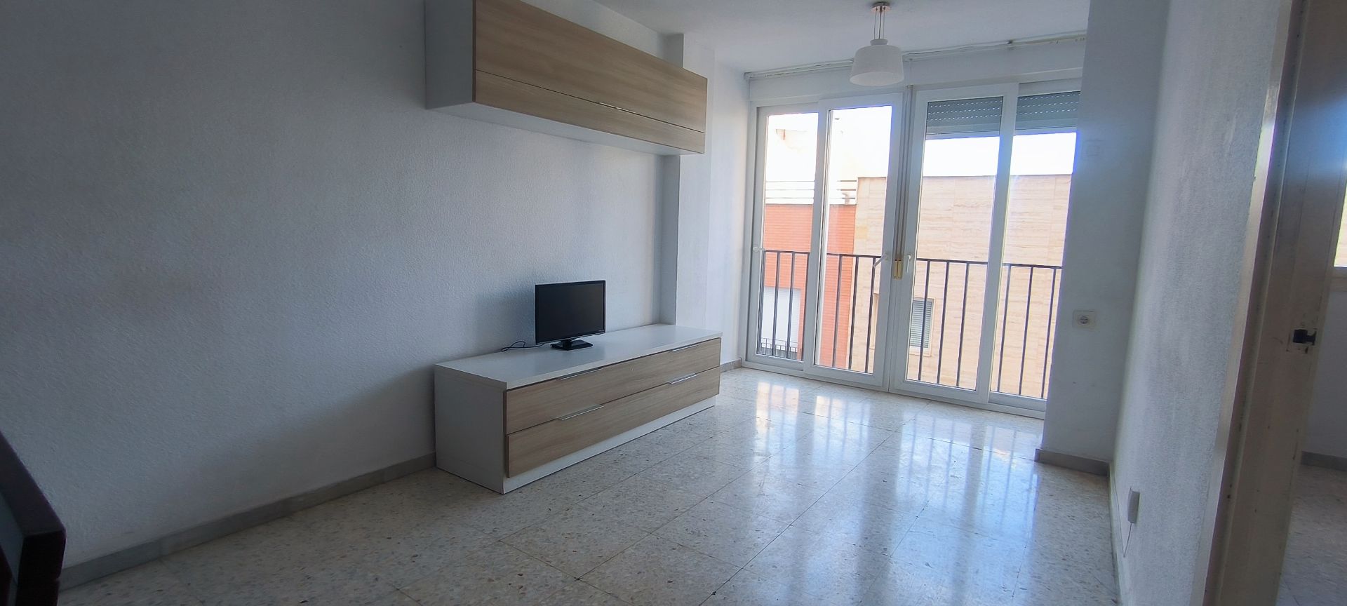Living room of Flat for sale in  Almería Capital  with Air Conditioner