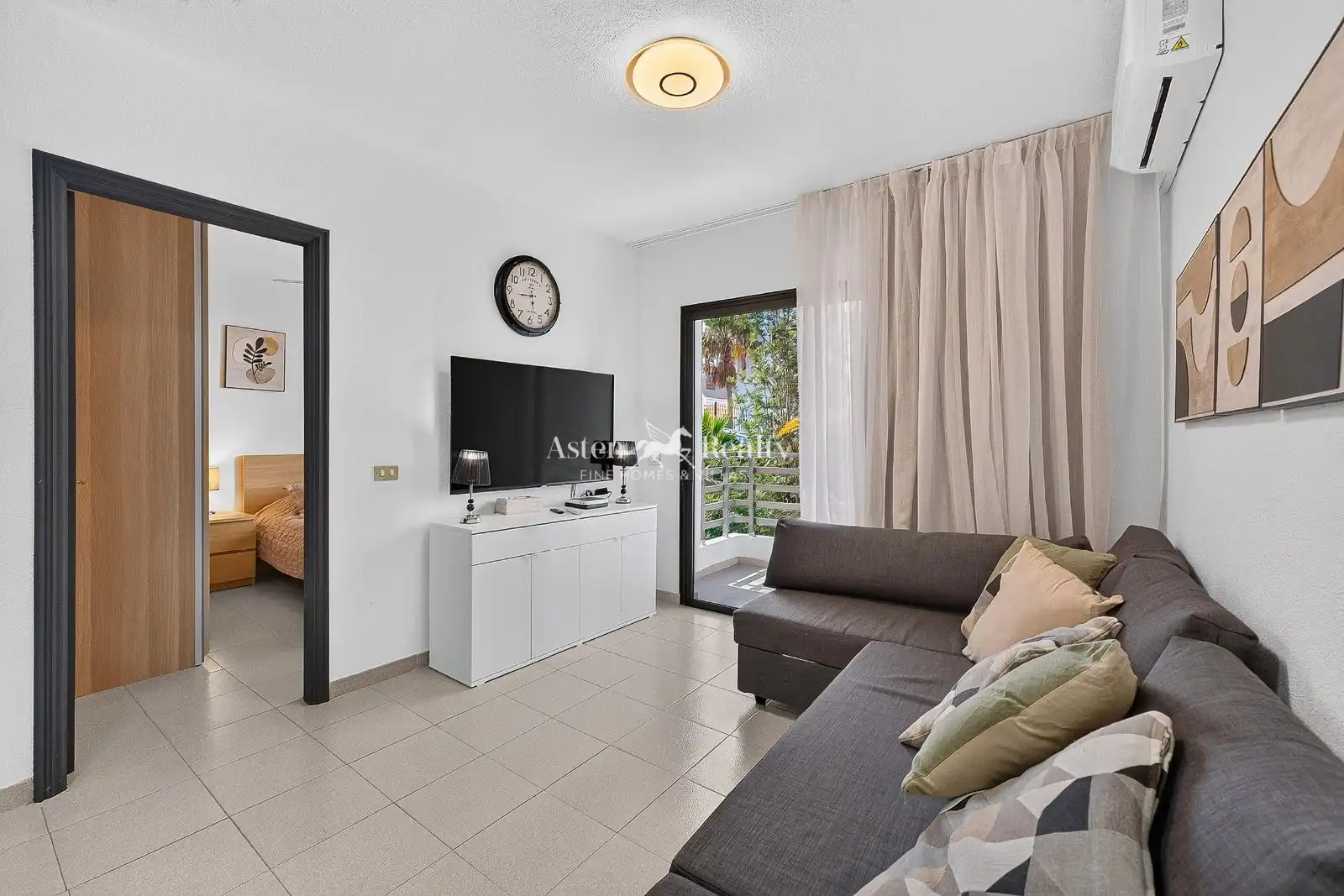 Sala d'estar de Apartament en venda en Santiago del Teide amb Aire condicionat, Terrassa i Piscina