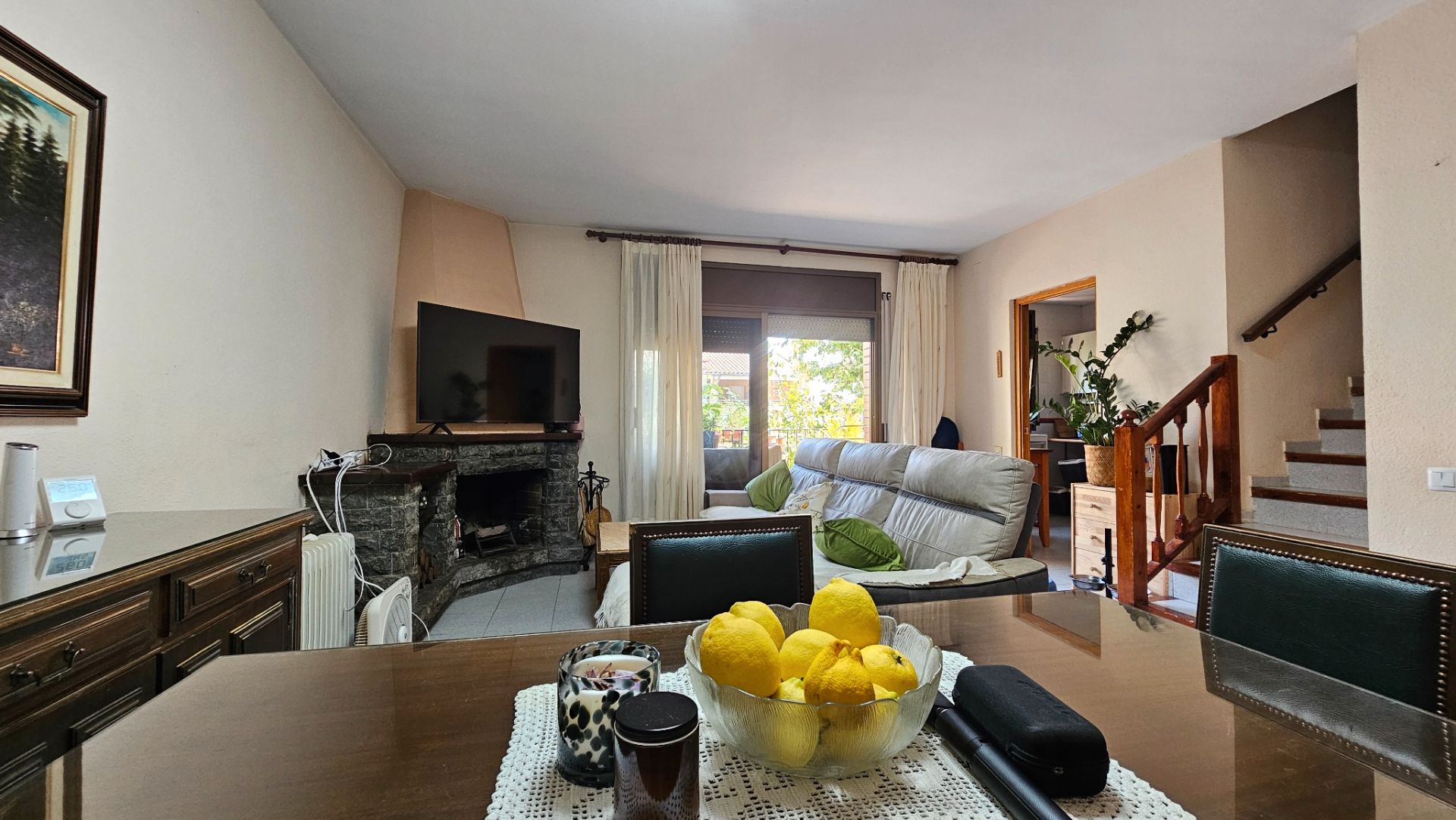 Sala d'estar de Casa adosada en venda en Sabadell amb Calefacció, Terrassa i Forn