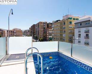 Swimming pool of Single-family semi-detached for sale in  Granada Capital  with Air Conditioner, Terrace and Swimming Pool