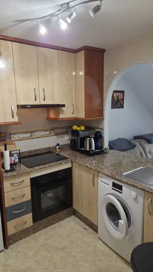 Kitchen of Attic for sale in Guardamar del Segura  with Air Conditioner, Terrace and Storage room