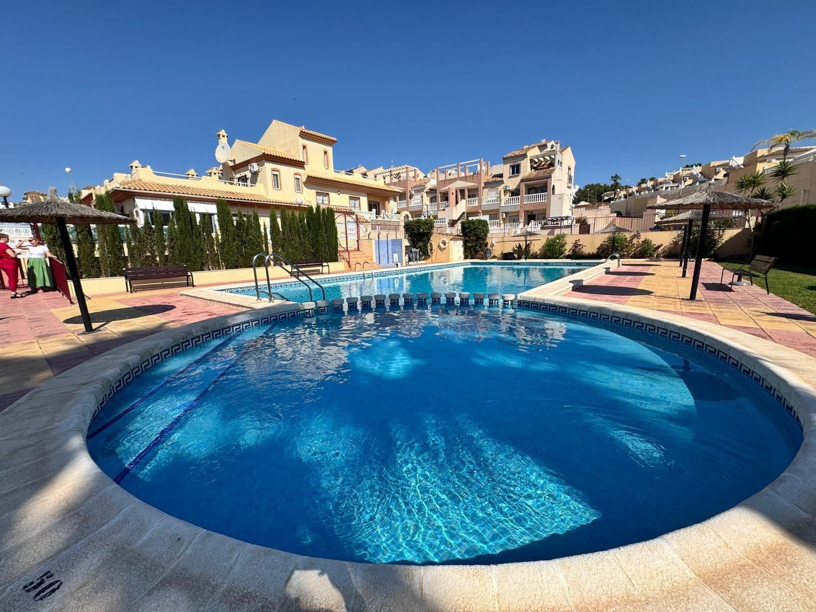 Swimming pool of Single-family semi-detached for sale in Orihuela  with Air Conditioner, Private garden and Terrace