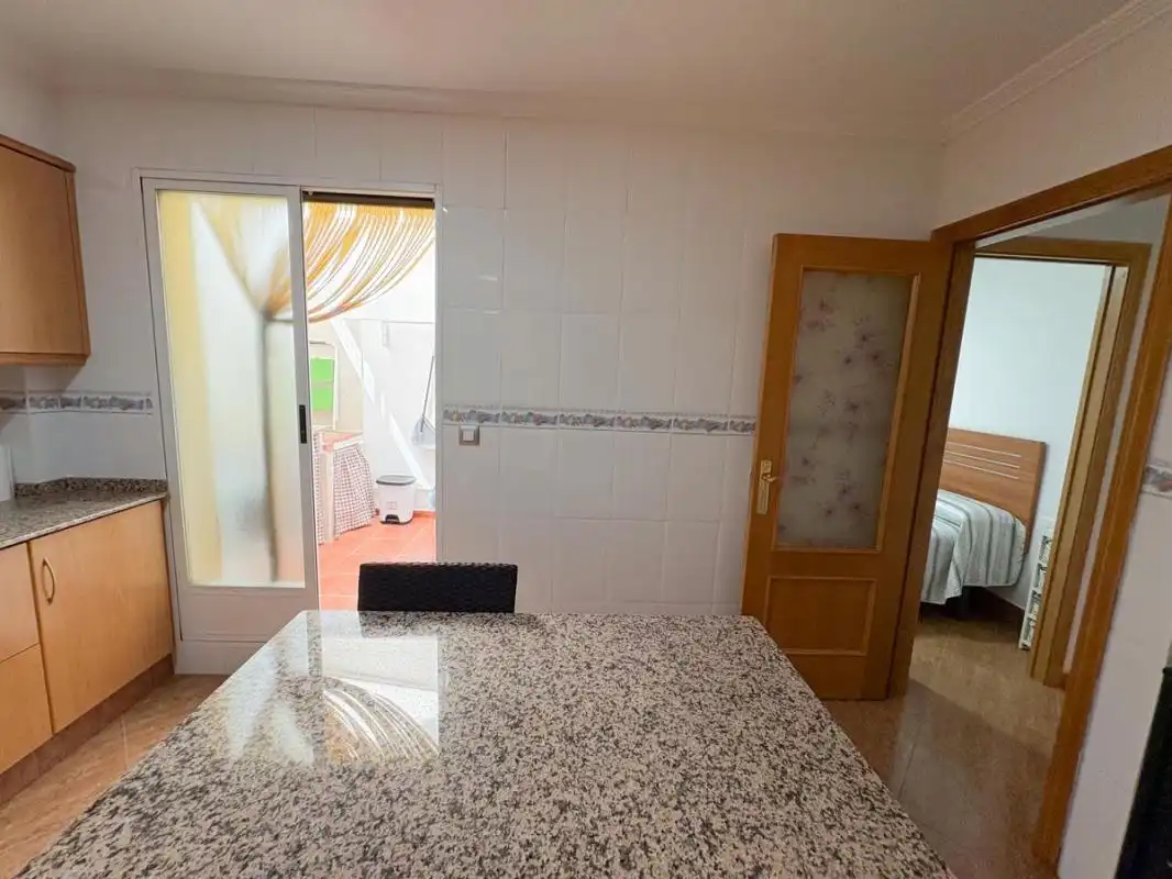 Cuina de Casa adosada en venda en Sagunto / Sagunt amb Aire condicionat, Calefacció i Terrassa