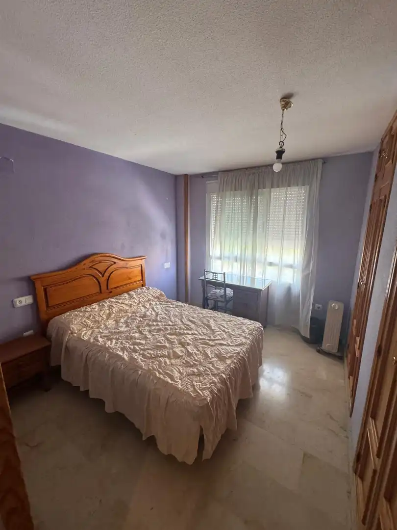 Bedroom of Flat for share in Jaén  with Swimming Pool, Furnished and Community pool