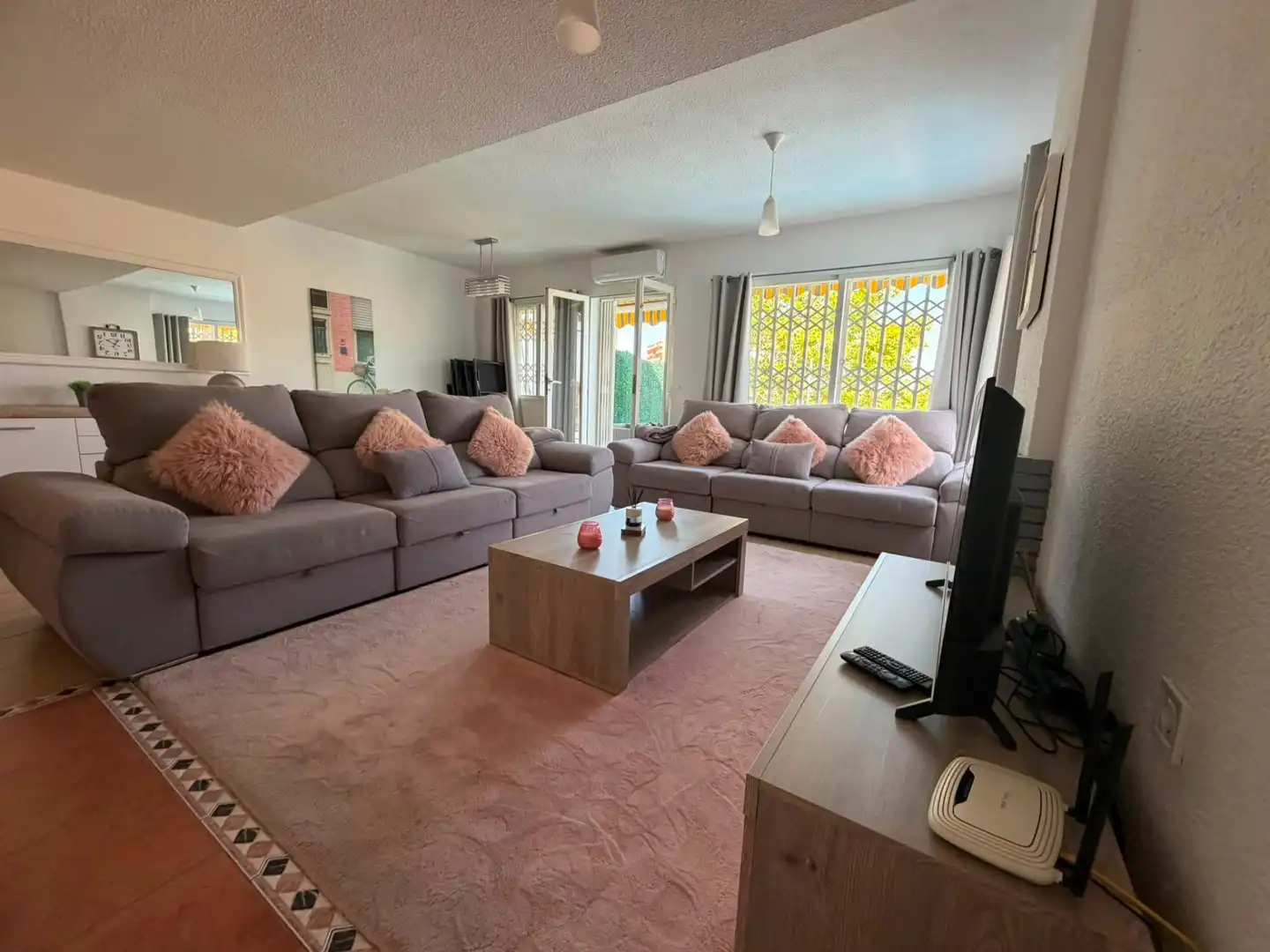 Sala de estar de Casa adosada en venta en Benidorm con Aire acondicionado, Calefacción y Jardín privado