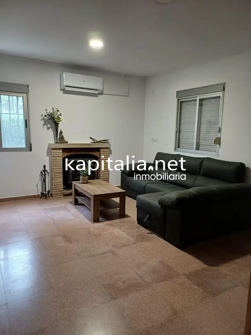 Sala d'estar de Casa o xalet en venda en Albaida amb Aire condicionat, Traster i Piscina