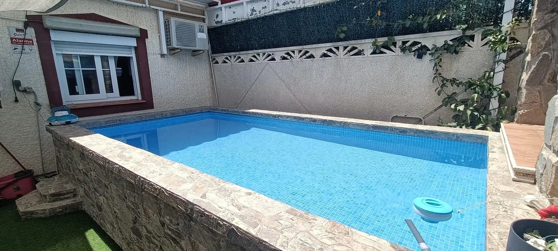 Piscina de Casa adosada en venta en La Nucia con Aire acondicionado, Calefacción y Jardín privado
