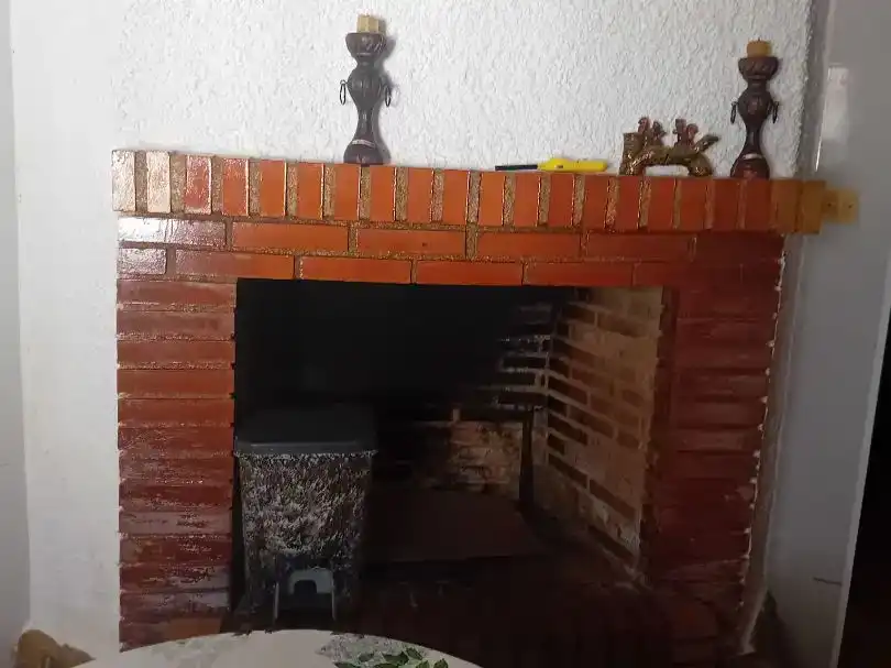 Sala d'estar de Casa adosada en venda en Martos amb Jardí privat, Traster i Piscina