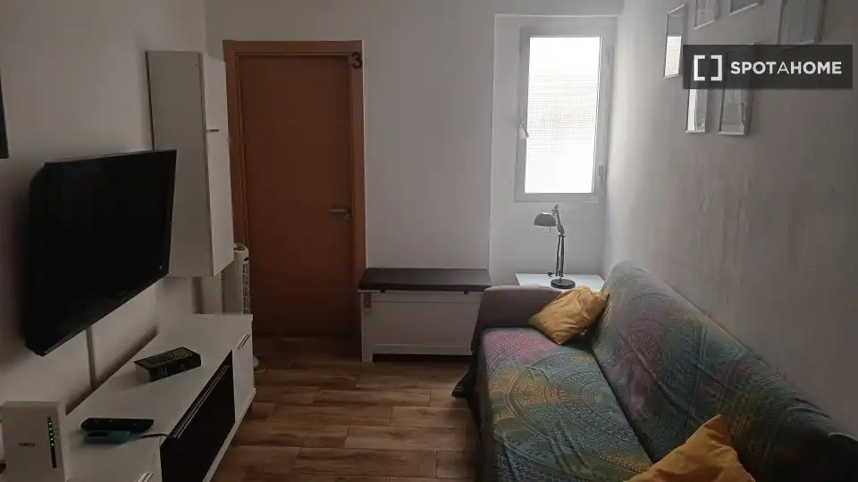 Sala d'estar de Pis per a compartir en Almería amb Aire condicionat, Terrassa i Moblat