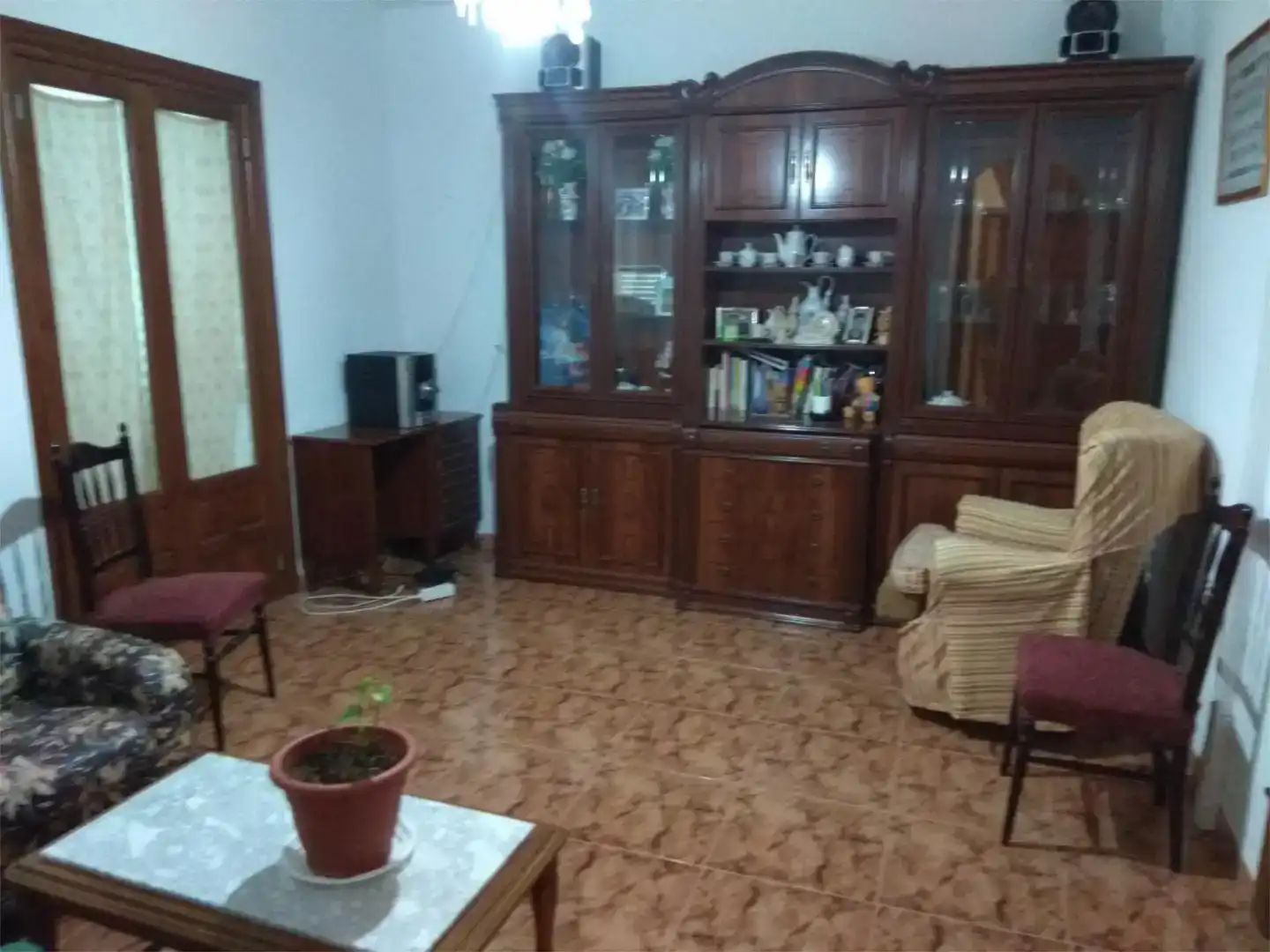 Sala d'estar de Casa adosada en venda en Arjonilla amb Aire condicionat, Traster i Balcó
