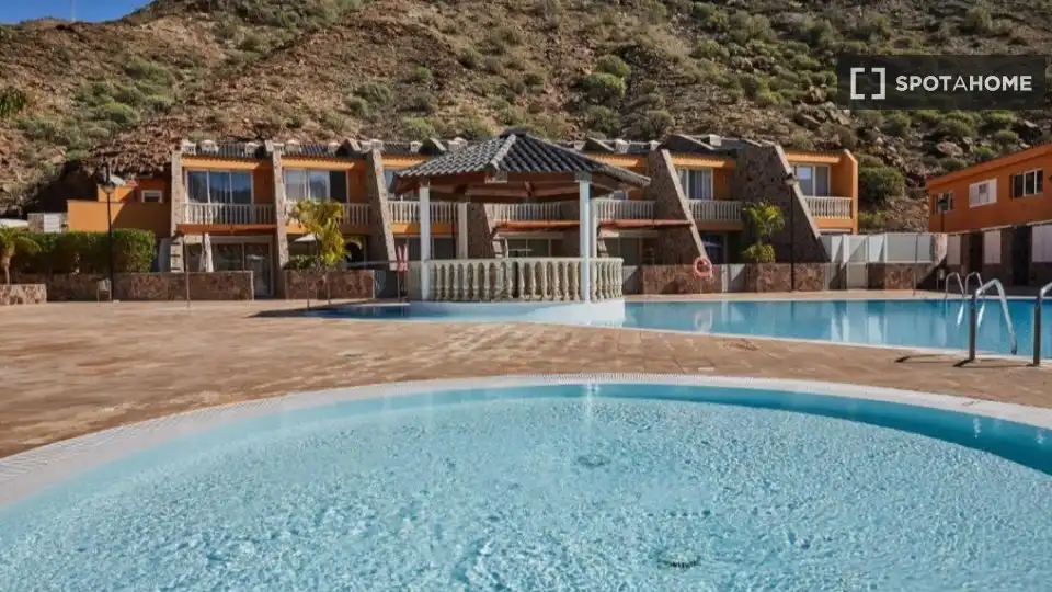 Piscina de Apartament per a compartir en Mogán amb Aire condicionat, Terrassa i Moblat