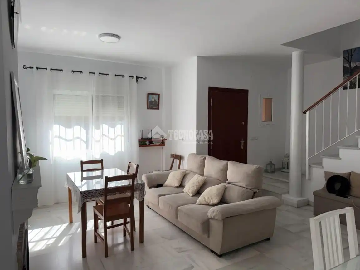 Living room of Detached homes for sale in La Algaba  with Air Conditioner, Private garden and Terrace