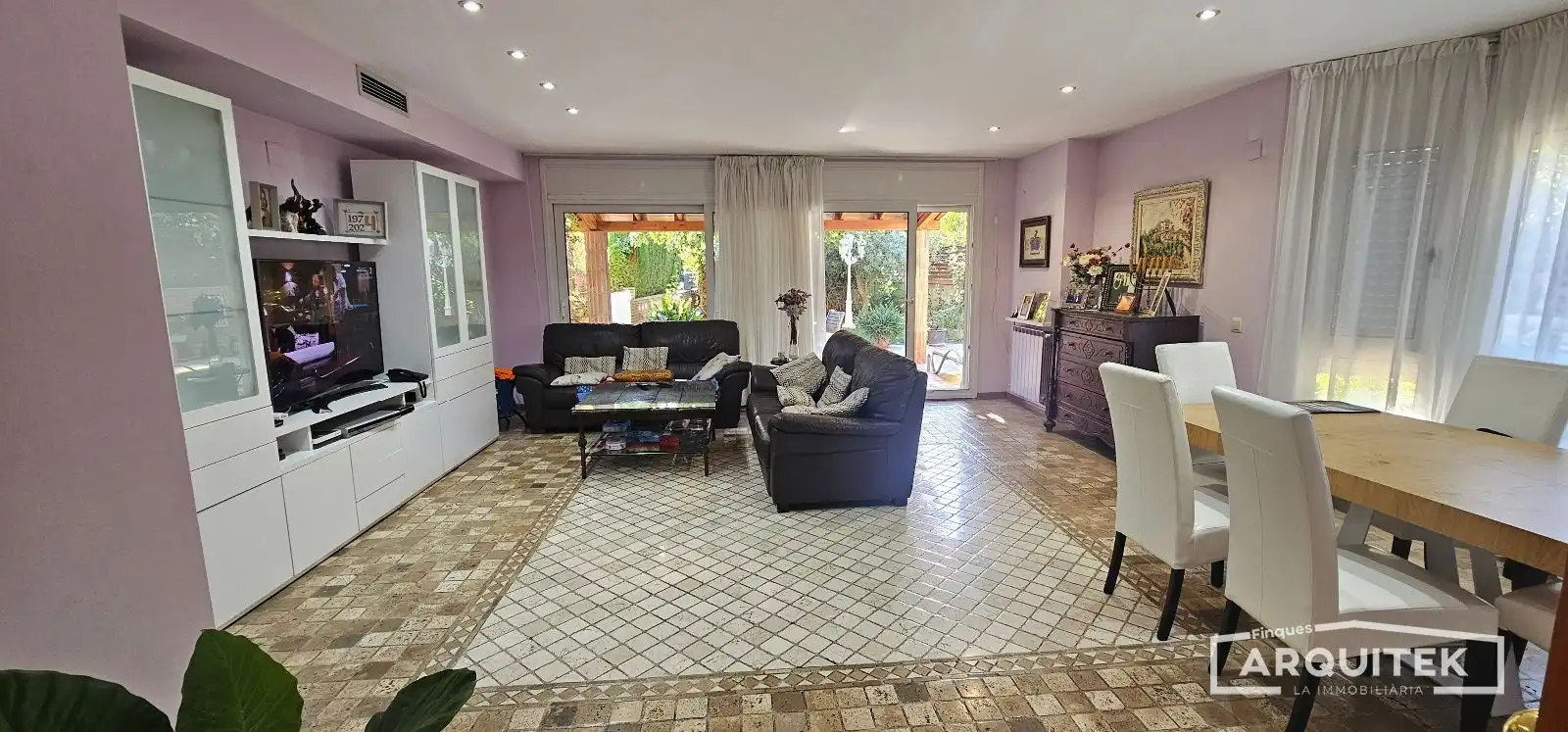 Sala de estar de Casa adosada en venta en Lleida con Aire acondicionado y Jardín privado
