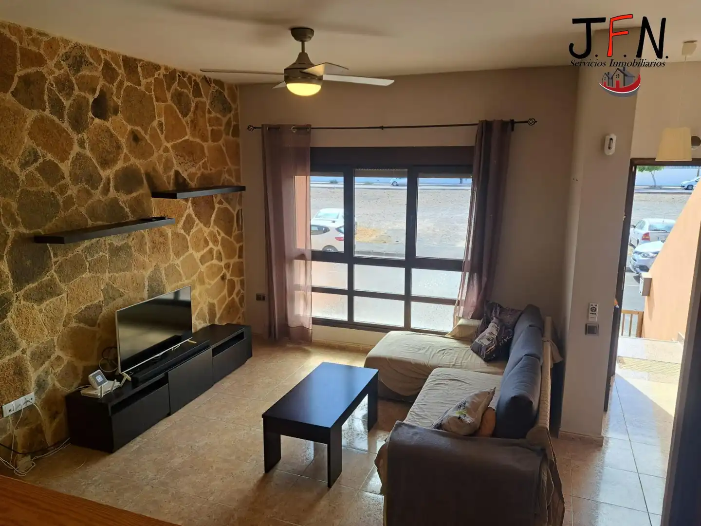 Sala de estar de Casa adosada en venta en Puerto del Rosario con Terraza, Trastero y Amueblado