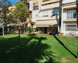 Jardí de Casa adosada en venda en La Pobla de Farnals amb Aire condicionat, Calefacció i Jardí privat