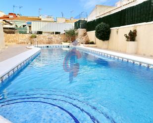 Swimming pool of Apartment for sale in Torrevieja  with Air Conditioner, Heating and Terrace