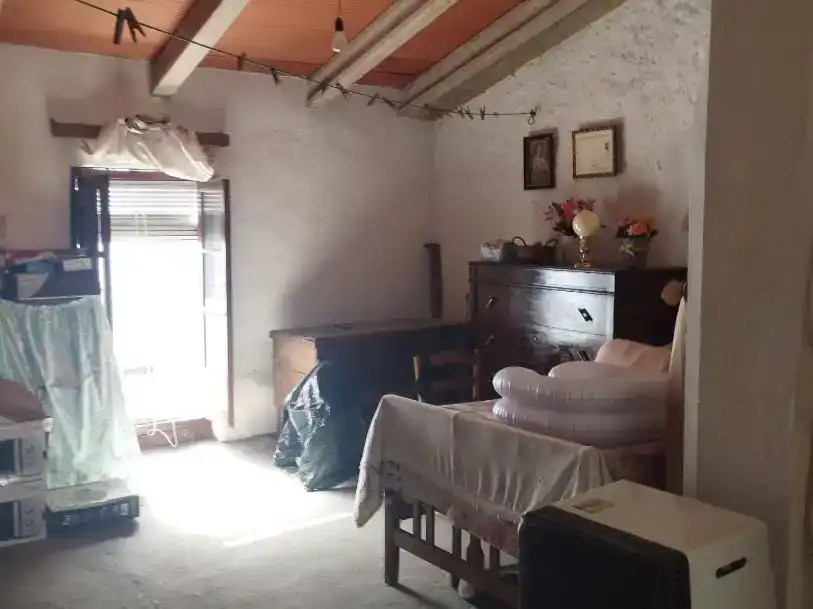 Sala d'estar de Casa adosada en venda en Cabeza la Vaca amb Balcó