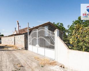 Vista exterior de Finca rústica en venda en Caniles amb Jardí privat