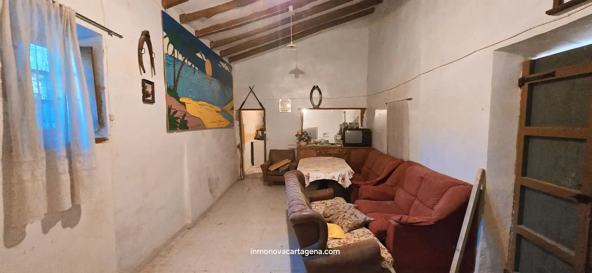Sala d'estar de Finca rústica en venda en Cartagena amb Jardí privat