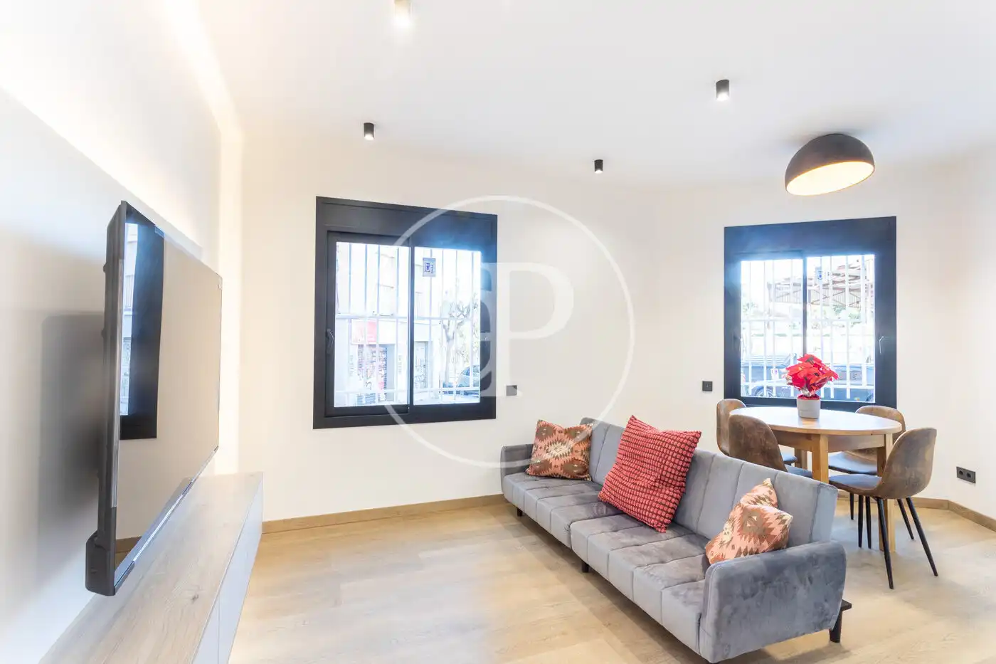 Sala de estar de Piso en venta en Sant Feliu de Llobregat con Aire acondicionado, Calefacción y Amueblado