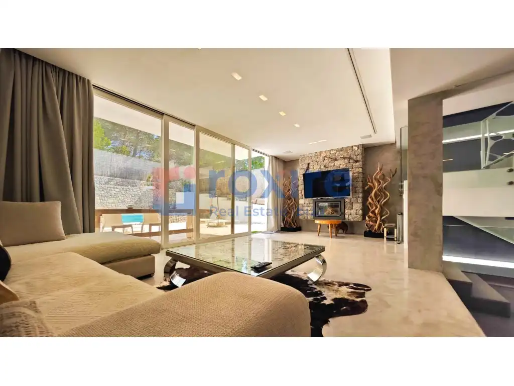 Sala d'estar de Casa o xalet en venda en Santa Eulària des Riu amb Aire condicionat, Jardí privat i Terrassa