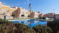 Swimming pool of Single-family semi-detached for sale in  Almería Capital  with Terrace and Community pool