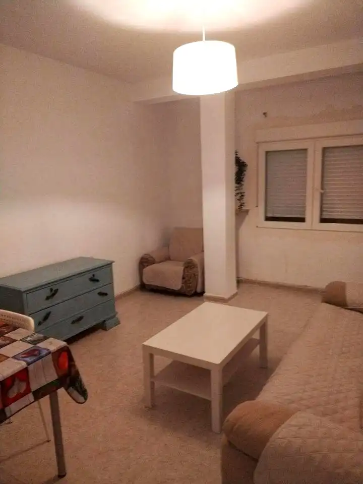 Sala d'estar de Pis de lloguer en Granada amb Aire condicionat i Moblat