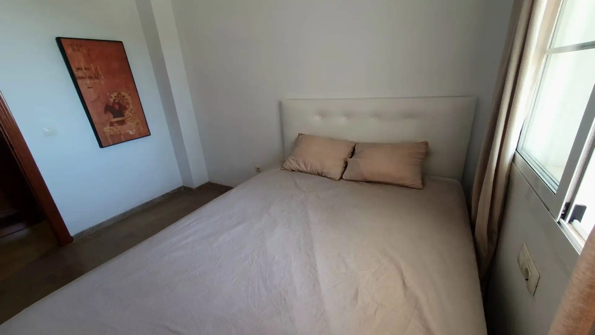 Dormitori de Apartament de lloguer en Benalmádena amb Terrassa, Moblat i Piscina comunitària