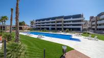 Swimming pool of Flat for sale in Orihuela  with Air Conditioner, Terrace and Swimming Pool