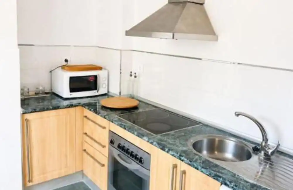 Cuina de Planta baixa de lloguer en Marbella amb Aire condicionat, Terrassa i Piscina