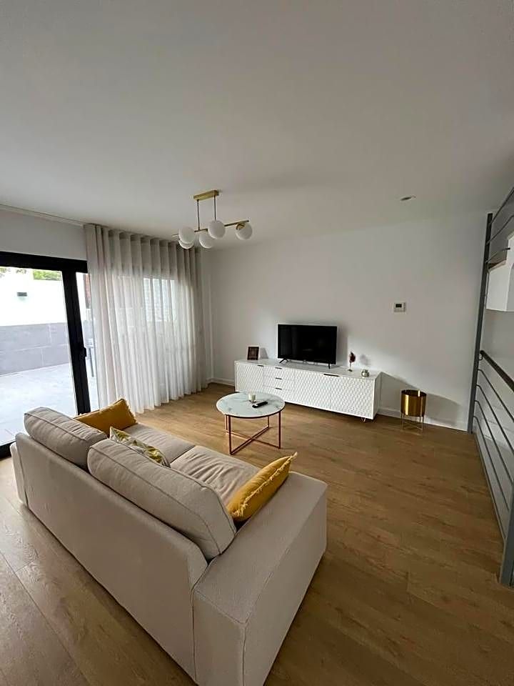 Living room of Single-family semi-detached for sale in Málaga Capital  with Air Conditioner, Terrace and Swimming Pool