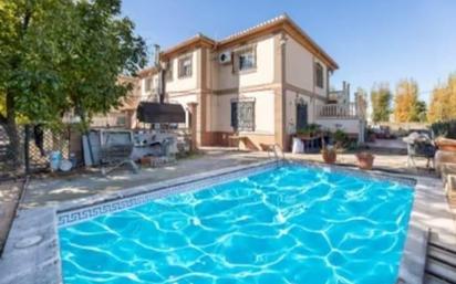 Piscina de Casa o xalet en venda en Ogíjares amb Jardí privat, Terrassa i Traster