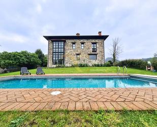 Vista exterior de Casa o xalet en venda en Cangas de Onís amb Calefacció, Jardí privat i Terrassa