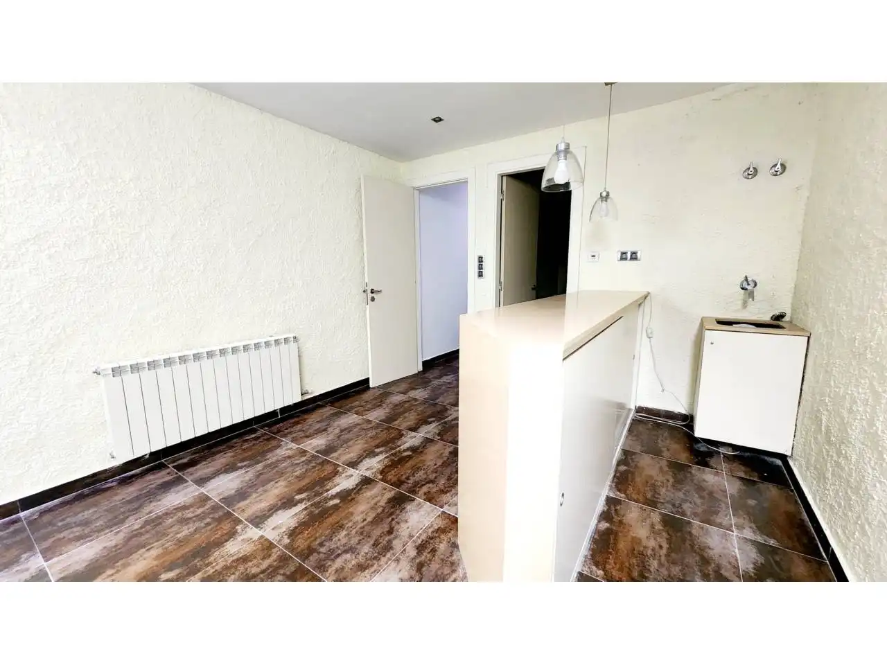 Küche von Einfamilien-Reihenhaus zum Verkauf in Sabadell mit Klimaanlage, Heizung und Terrasse