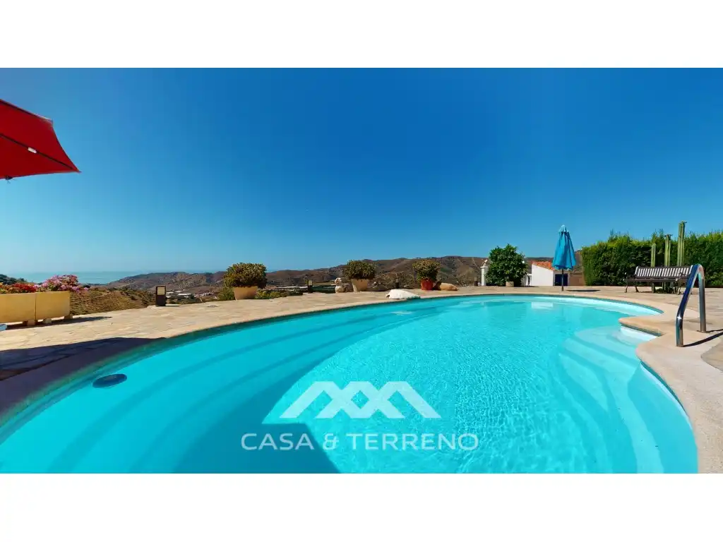 Vista exterior de Casa o xalet en venda en Iznate amb Aire condicionat, Calefacció i Jardí privat