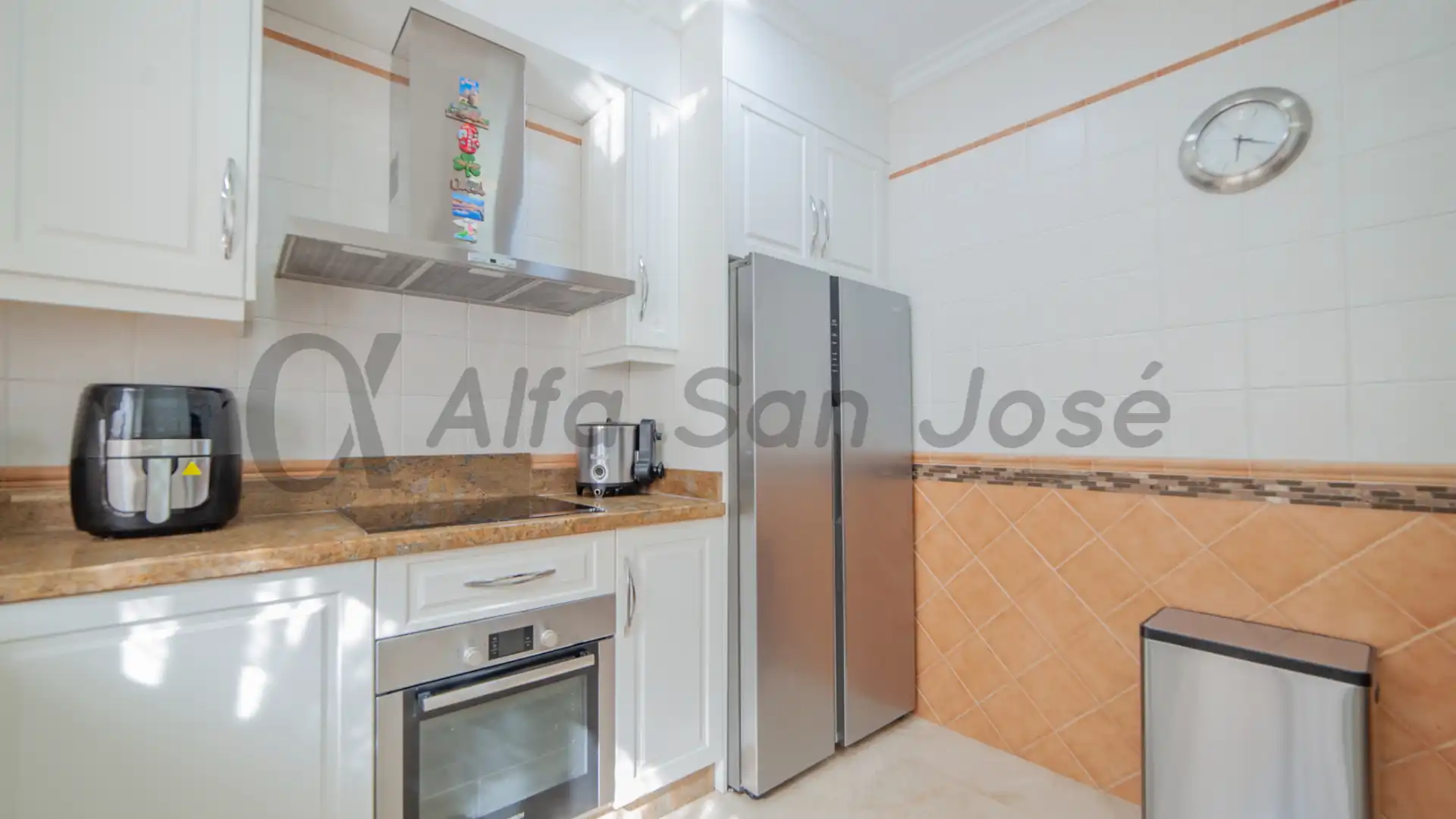Kitchen of Single-family semi-detached for sale in La Rinconada  with Terrace, Swimming Pool and Furnished