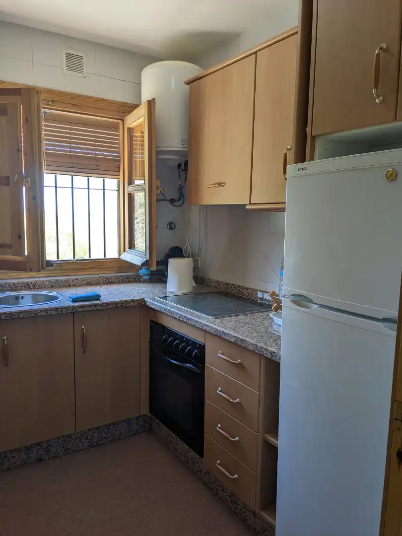 Cuina de Casa o xalet en venda en Vélez de Benaudalla amb Jardí privat i Moblat