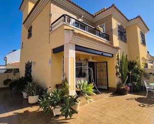 Exterior view of Single-family semi-detached for sale in Pilar de la Horadada  with Furnished and Washing machine