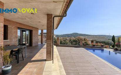 Terrassa de Casa o xalet en venda en Sant Julià del Llor i Bonmatí amb Aire condicionat, Jardí privat i Terrassa