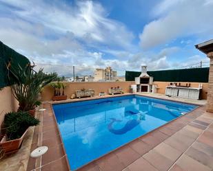 Piscina de Casa adosada en venda en Santa Eulària des Riu amb Aire condicionat, Calefacció i Jardí privat