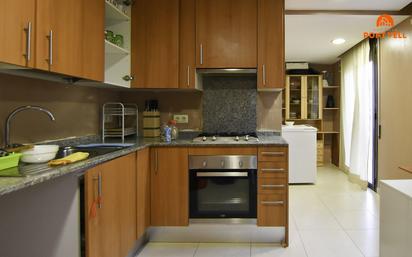 Kitchen of Duplex for sale in La Bisbal d'Empordà  with Heating, Terrace and Storage room