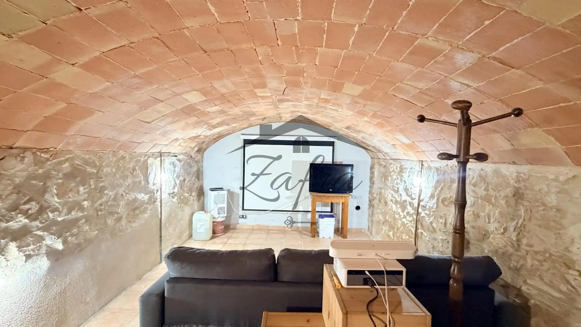 Sala d'estar de Casa adosada en venda en Llagostera amb Calefacció i Terrassa