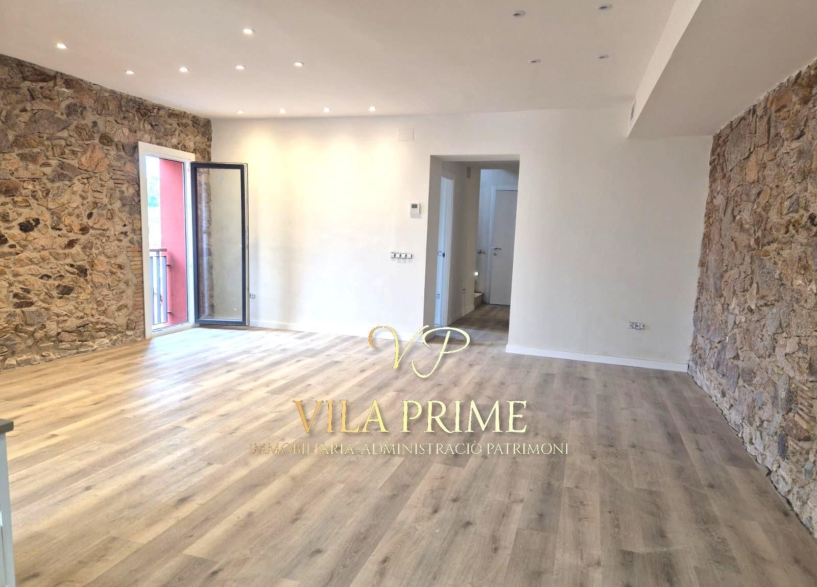 Sala de estar de Ático en venta en Sant Feliu de Guíxols con Aire acondicionado, Calefacción y Parquet