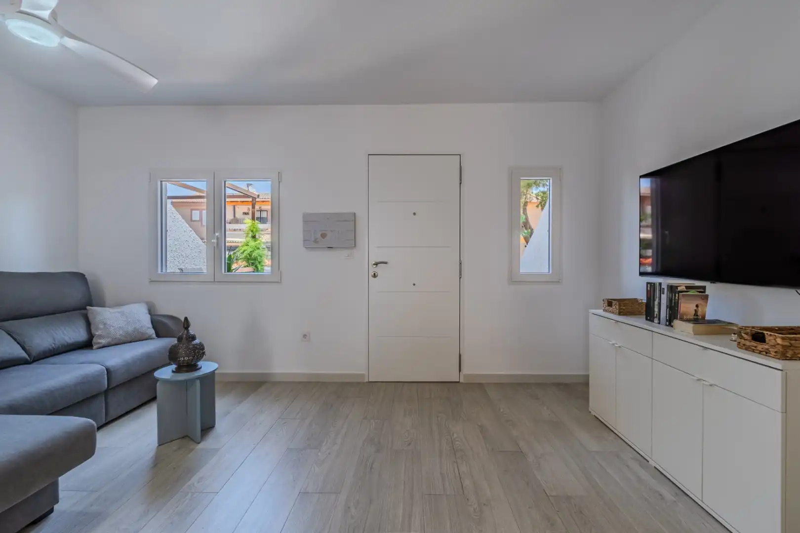 Sala d'estar de Casa adosada en venda en Los Alcázares amb Aire condicionat, Terrassa i Traster