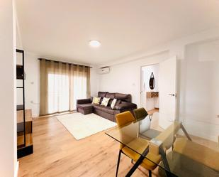 Living room of Flat to share in  Granada Capital  with Air Conditioner, Terrace and Balcony