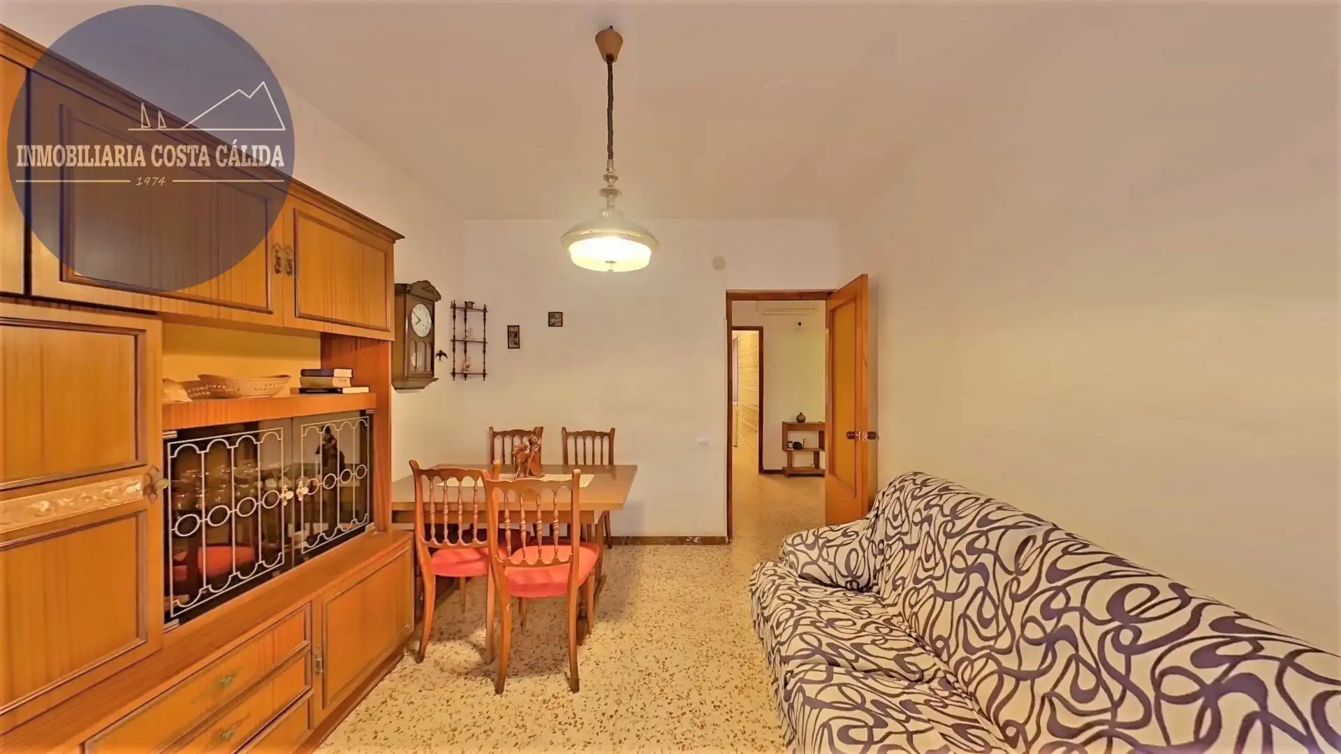 Sala d'estar de Casa adosada en venda en Águilas amb Aire condicionat, Terrassa i Traster