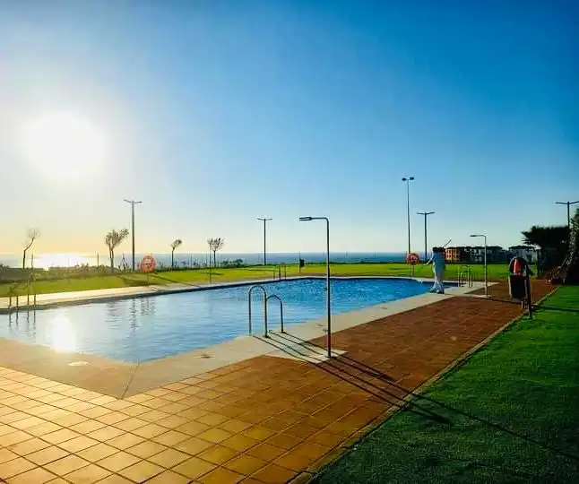 Swimming pool of Flat for sale in Manilva  with Air Conditioner, Heating and Terrace