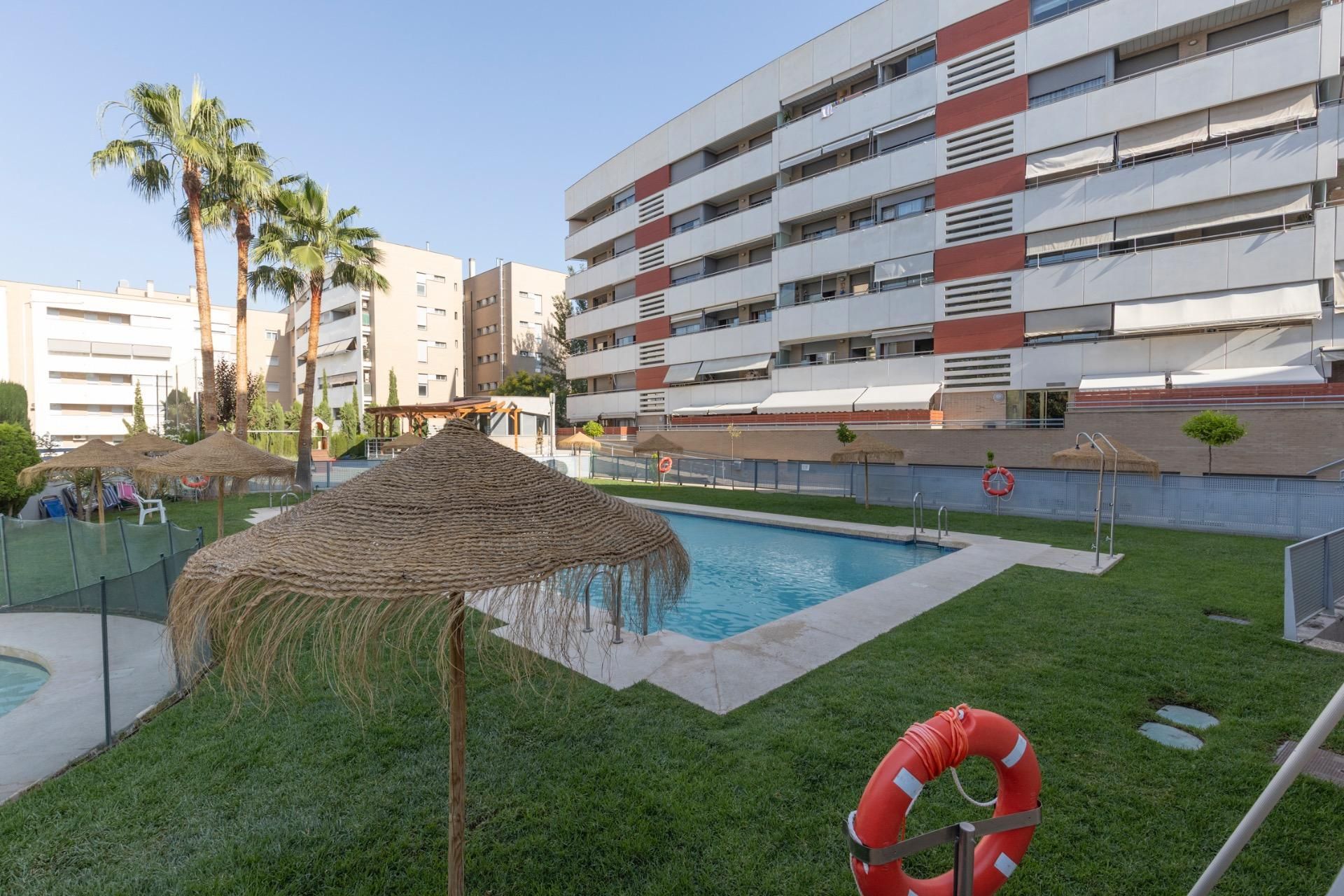 Swimming pool of Flat for sale in  Granada Capital  with Air Conditioner, Heating and Terrace