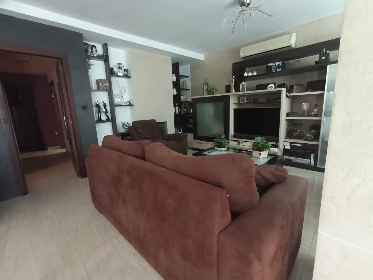 Sala d'estar de Casa o xalet en venda en El Campello amb Aire condicionat, Jardí privat i Terrassa