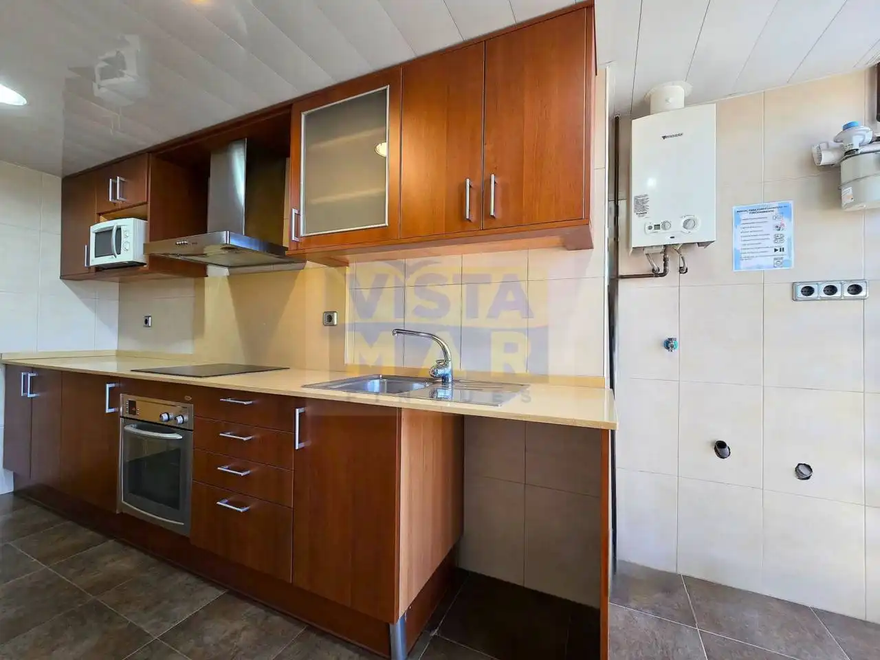 Kitchen of Attic for rent in Cubelles  with Air Conditioner, Heating and Parquet flooring